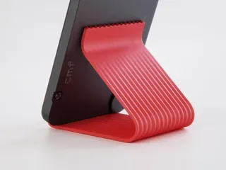 Akışkan Formlu Telefon Standı — Sert Plastik