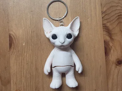 Flexi Sphynx Kedi Anahtarlık — Sert Plastik